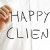 Man writing Happy Client on a virtual screen